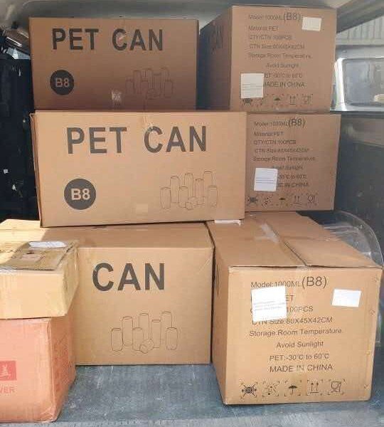 Packed cartons stacked inside a van at a warehouse in China, ready for handover to a shipping company